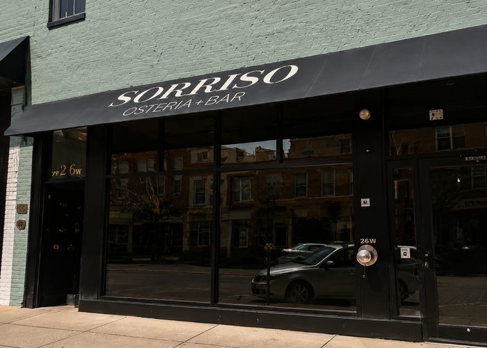 The storefront and entrance of Sorriso Osteria and Bar on West High Street.